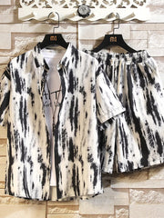 Men's abstract print short-sleeve shirt and shorts set in black and white.