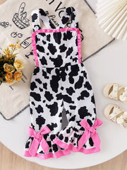 Children's Cow Print Ruffle Jumpsuit in Brown And White, side view