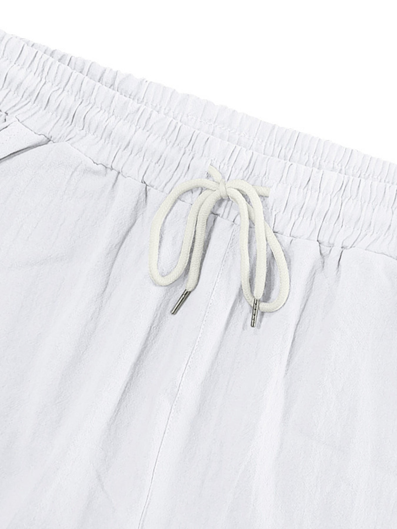 White cargo sweatpants with drawstring waist and metal-tipped cords.
