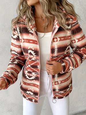 Aztec-inspired sherpa zip hoodie in brown with a tribal pattern, featuring a full zip and hood.