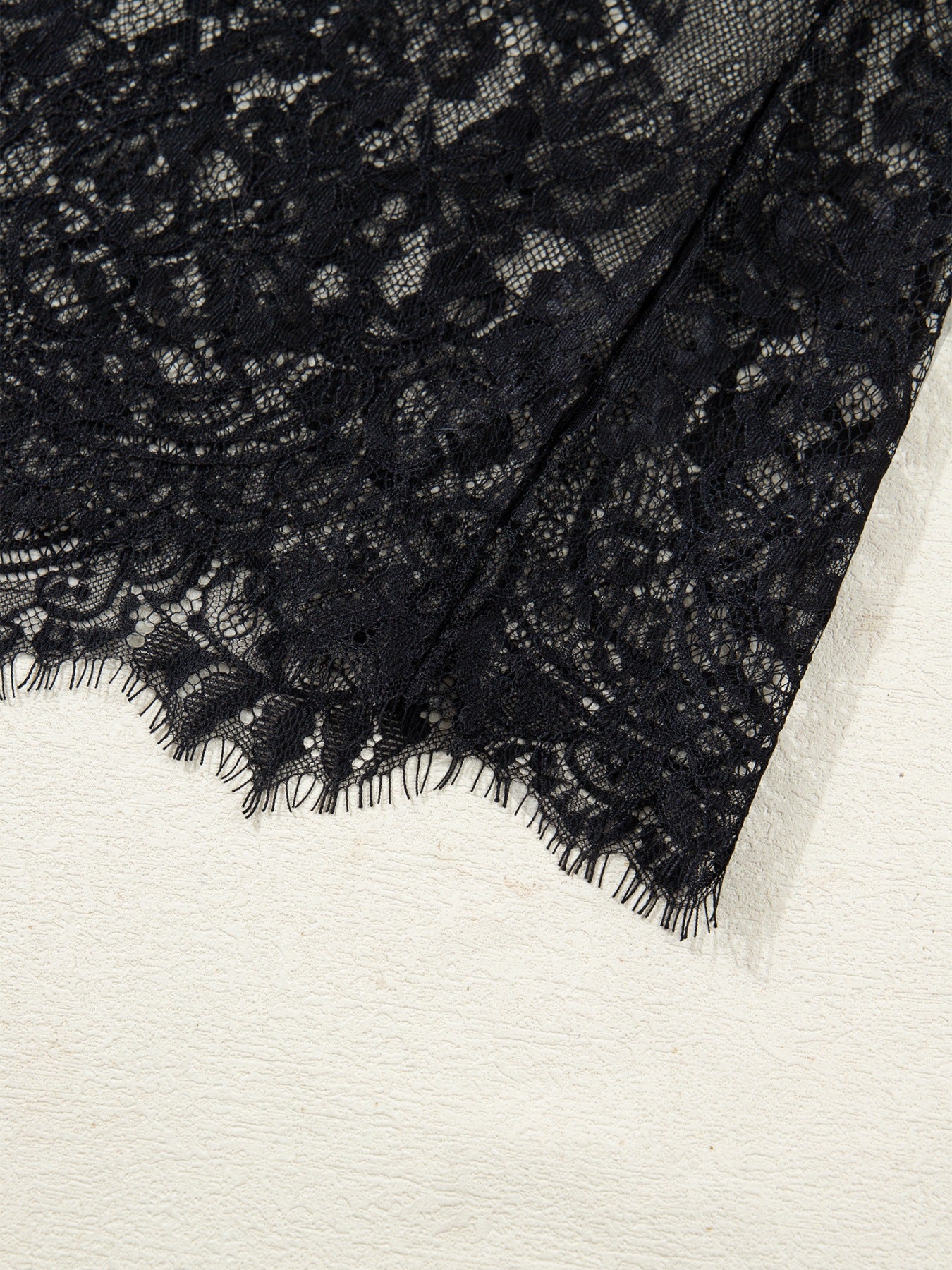 Black floral lace maxi dress detail with scalloped hem
