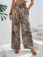 Paisley palazzo trousers in multicolor with a drawstring waist and wide legs.