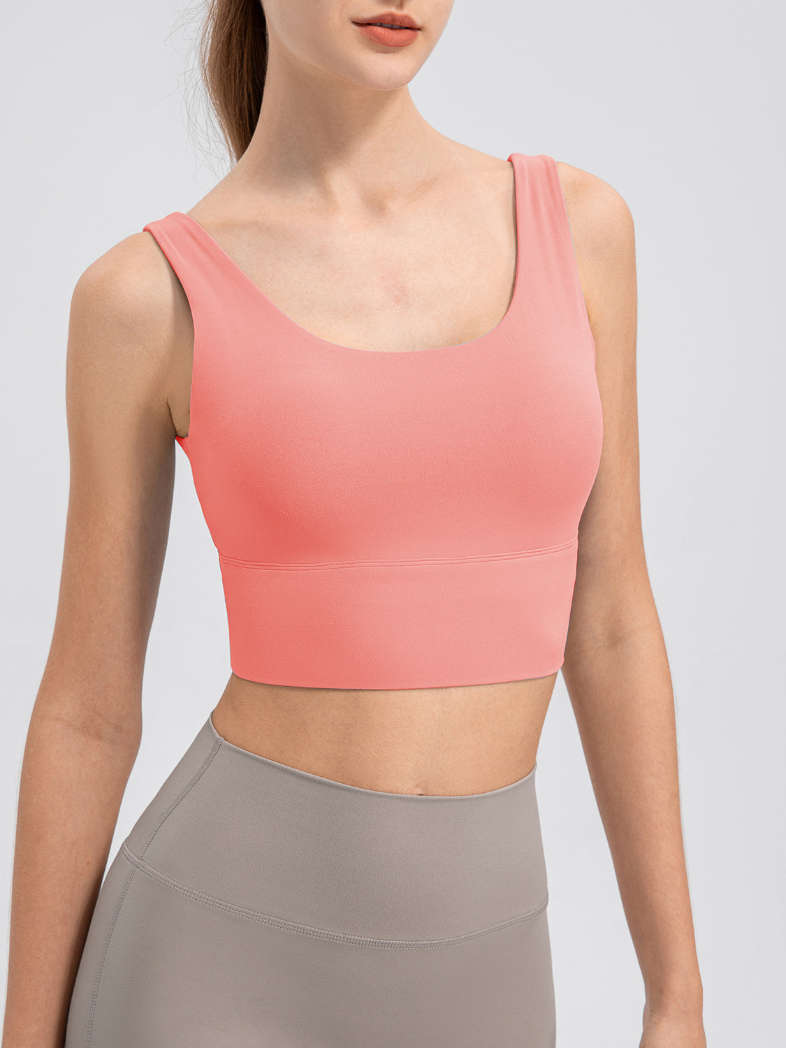 Coral performance crop top with scoop neck and wide band