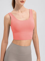 Coral performance crop top with scoop neck and wide band