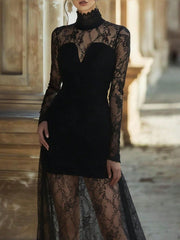 Black lace high neck maxi dress with long sleeves and sheer lace skirt.