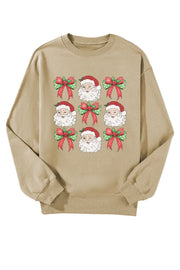 Khaki cotton crewneck sweatshirt with a grid pattern of Santa faces and festive bows.