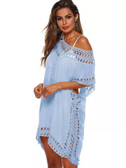 Sky blue crochet V-neck cover-up dress with cutout details and fringe hem.