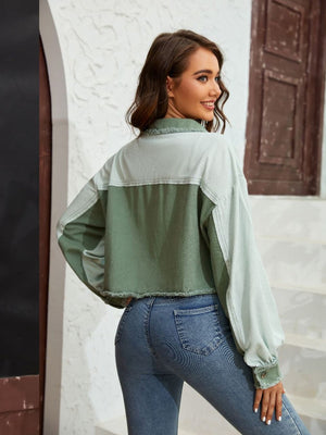 Textured colorblock cropped jacket in matcha green and light green with raw edges.