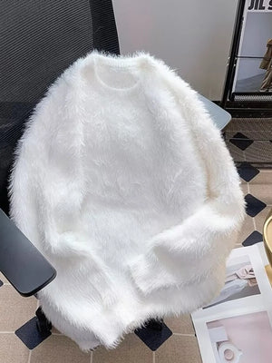 White fluffy knit pullover sweater with crew neck and long sleeves.