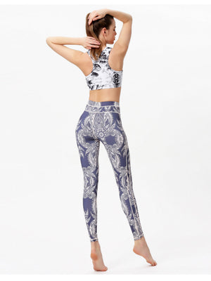 Navy leggings with white cosmic print and piping detail.