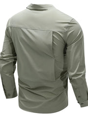 Bean green cotton overshirt with long sleeves and flap pocket detail on back.