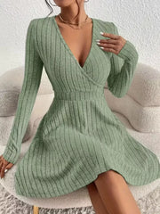 Sage ribbed wrap mini dress with V-neck and long sleeves.