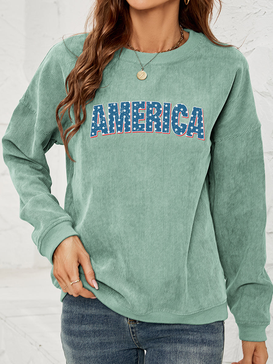 Corduroy sweatshirt in Gum Leaf with "America" graphic, crewneck, long sleeves.