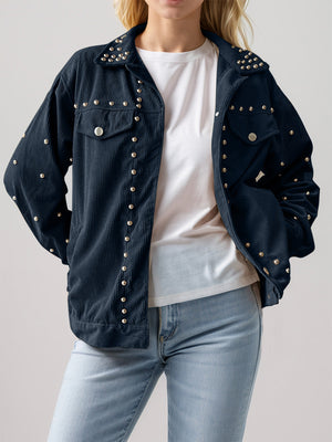 Black corduroy studded overshirt with relaxed fit and collar, buttoned front.