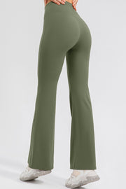 Matcha green flared leggings with a high waist, shown from the back.