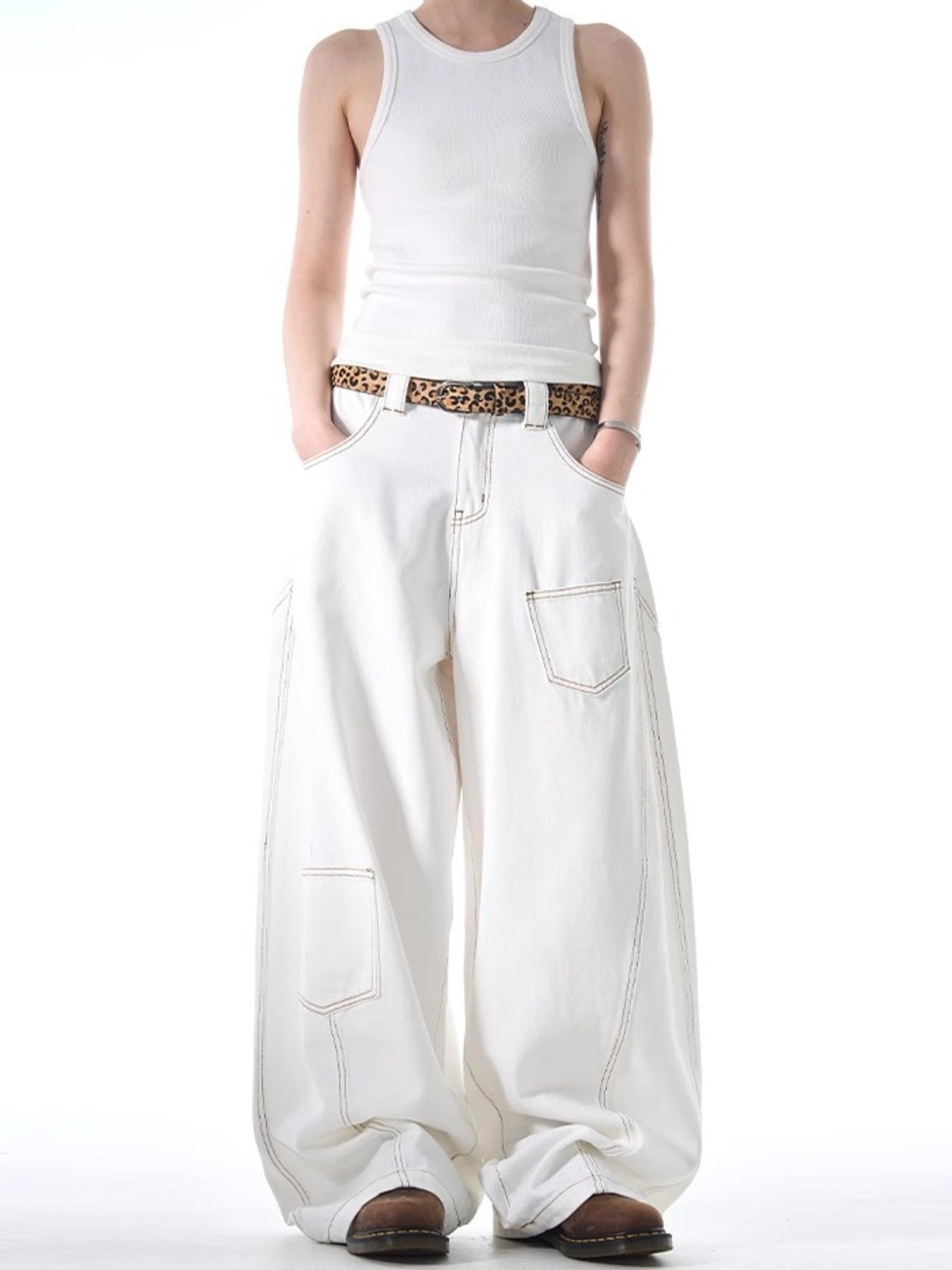 White cotton wide-leg jeans with contrast stitching and functional pockets