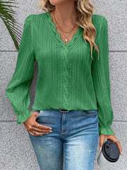 Mid Green textured pleat blouse with lace trim V-neck and ruffled cuffs.