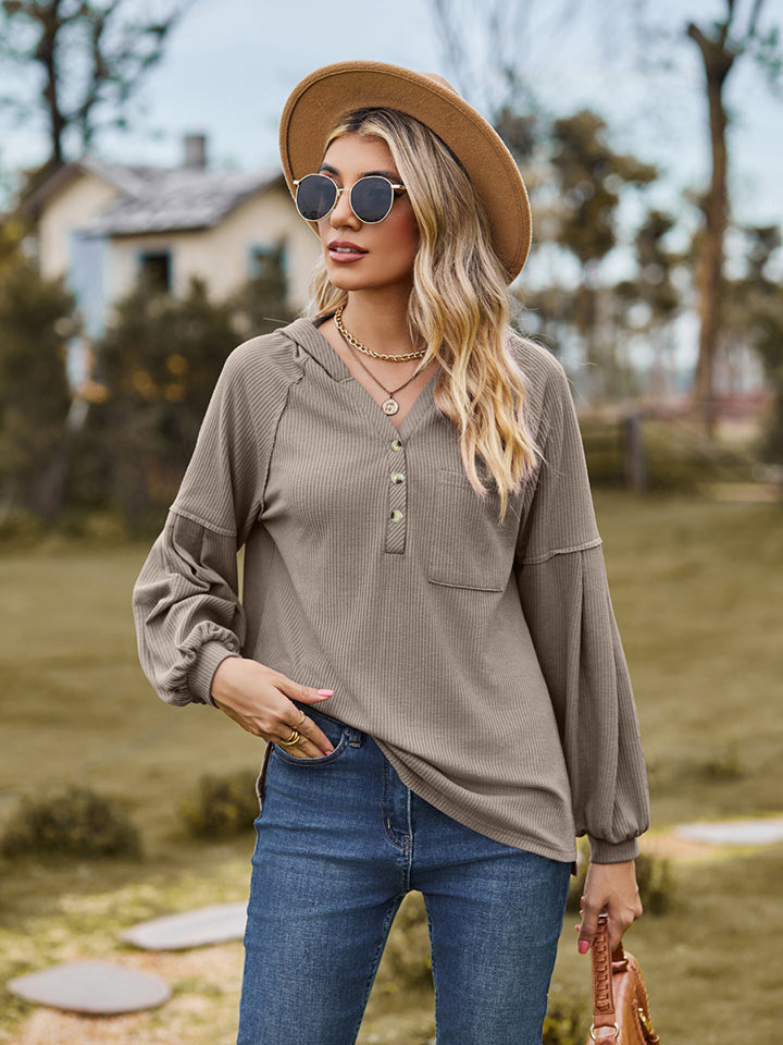 Mocha ribbed henley hoodie with balloon sleeves and buttoned placket.