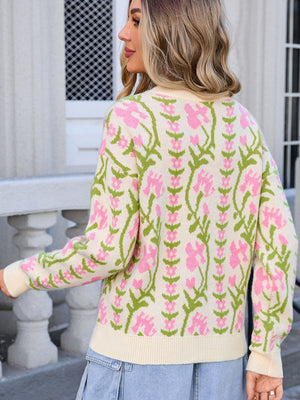 Floral tapestry crewneck sweater in cream with pink and green blooms, acrylic knit.