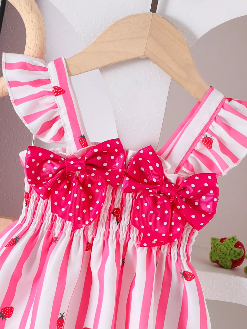 Children's Bow Ruffled Striped Top And Shorts Set in Pink, model styling view