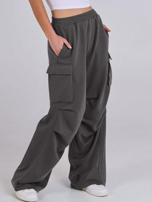 Dark Gray sweatpants with cargo pockets and wide legs.