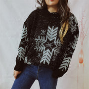 Black acrylic sweater with snowflake pattern and metallic threads