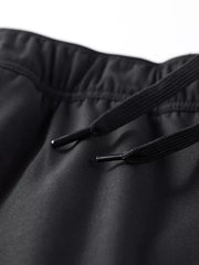 Black sweatpants with drawstring detail