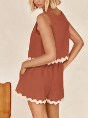 Chic Cut Set outfit in rust orange with scalloped trim, sleeveless top and shorts.