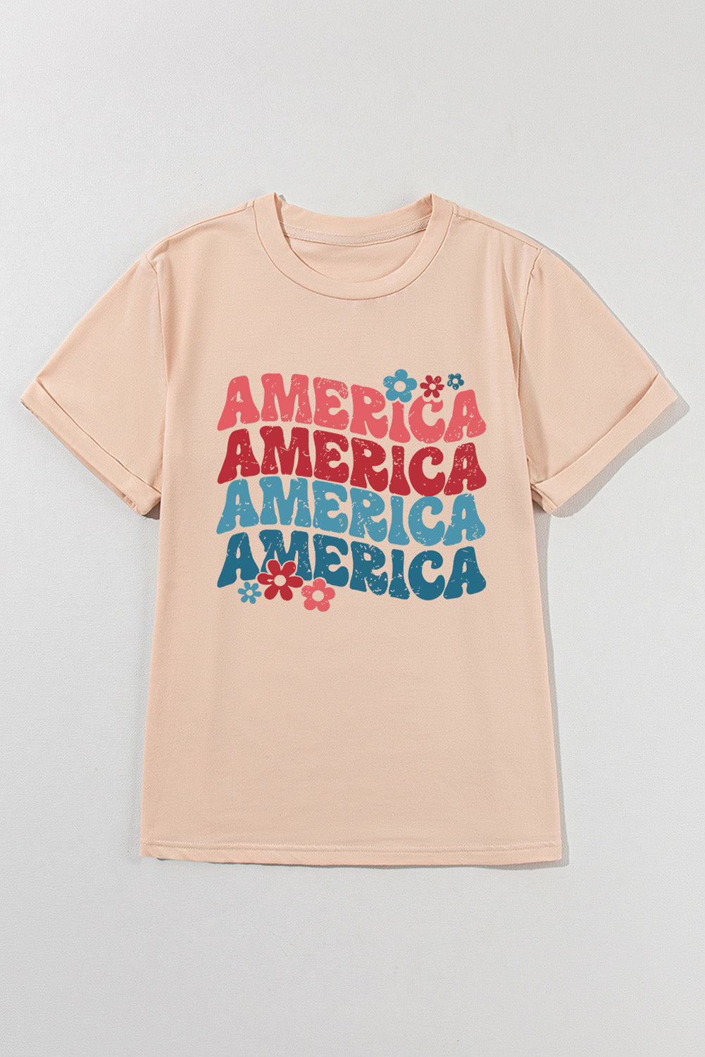 Tan t-shirt with stacked "America" graphic and flowers, 70s-inspired style