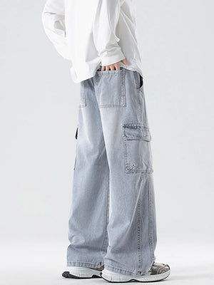 Light blue oversized cotton cargo jeans with drawstring waist and multiple pockets.
