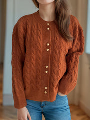 Caramel cable knit cardigan with puff sleeves and gold buttons