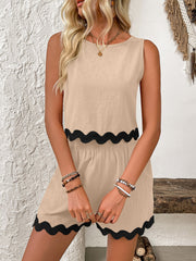 Tan sleeveless outfit set with black scalloped trim and elastic waist shorts