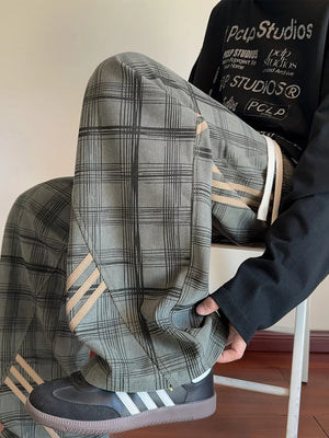 Men's Plaid Wide-leg Sweatpants With Side Stripes in Green, model styling view