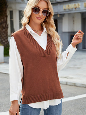 Ribbed knit V-neck sweater vest in caramel, styled over a white button-down shirt.