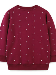 Burgundy polka dot baby sweatshirt with crew neck and ribbed cuffs and hem.