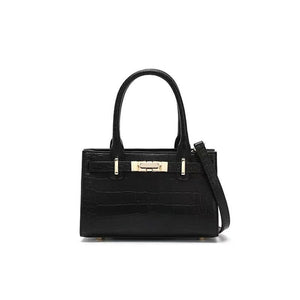 Black crocodile-embossed mini tote handbag with gold hardware and top handles.