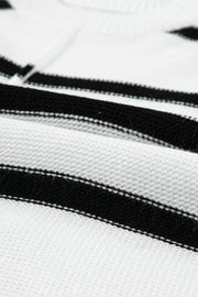 Horizontal stripe knit shell top in white with black stripes, acrylic knit fabric.