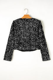 Black sequin embellished cropped open jacket with long sleeves.