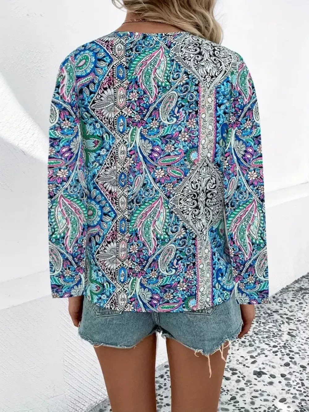 Bohemian paisley v-neck shirt with long sleeves in multicolor.