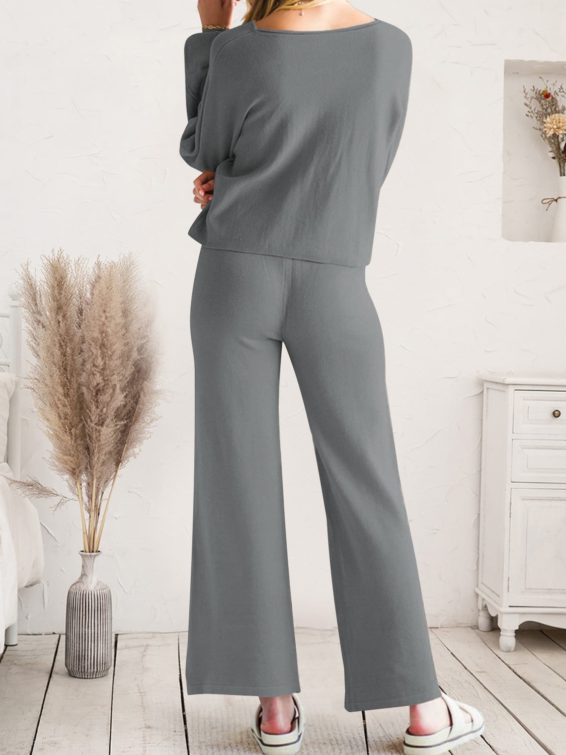 Dark gray acrylic wide-leg loungewear set with long sleeves and a relaxed fit.