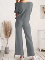 Dark gray acrylic wide-leg loungewear set with long sleeves and a relaxed fit.