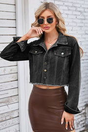 Black washed denim bolero jacket with raw hem and button front.