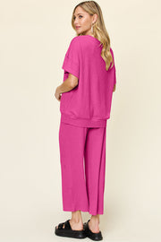 Hot Pink waffle knit loungewear set with short sleeves and wide leg pants.