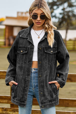 Black oversized denim trucker jacket with classic buttoned front and chest pockets.