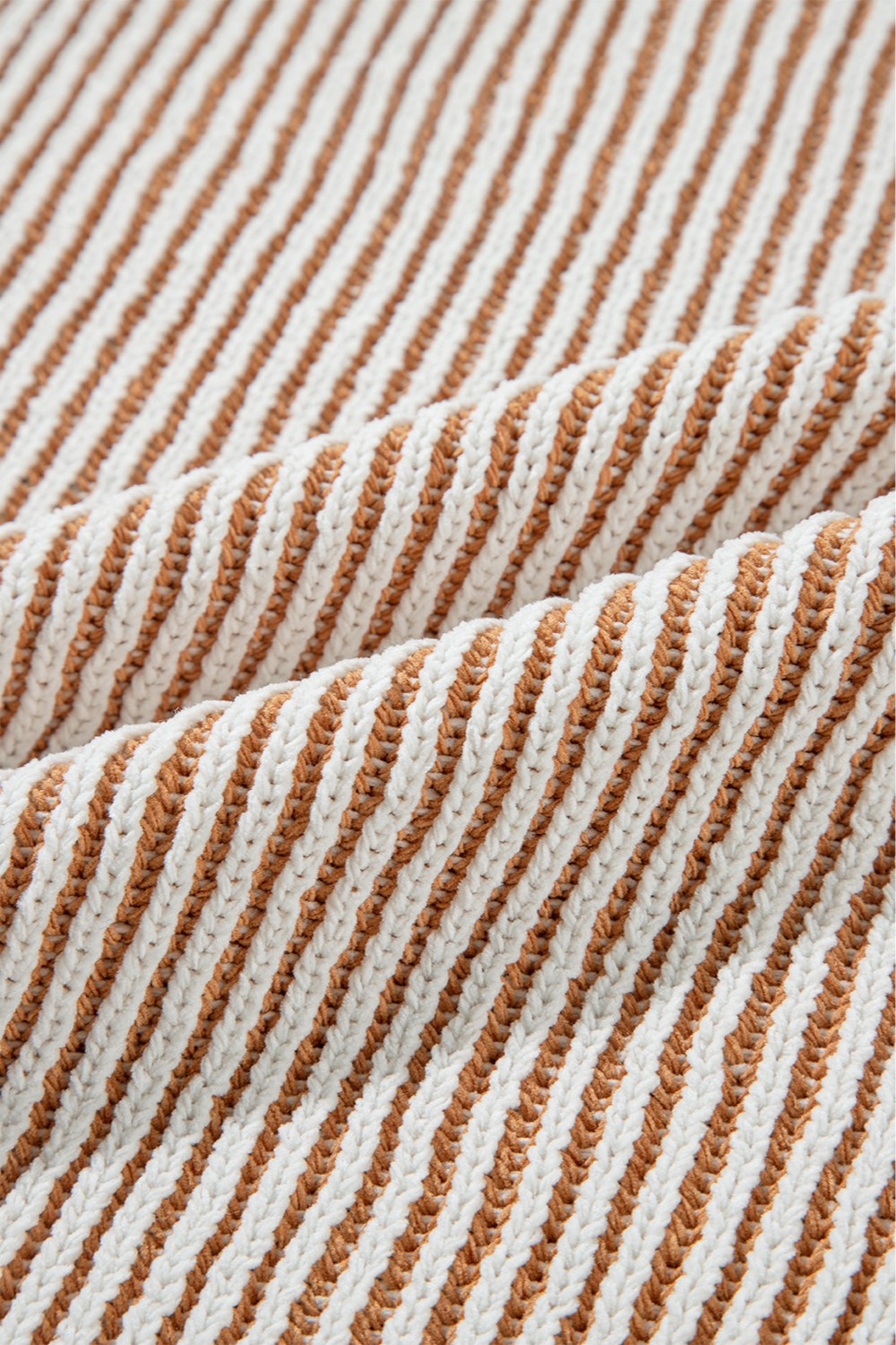 Camel and white striped knit sweater with a textured stitch detail