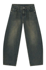 Faded baggy denim jeans in a deep teal wash with a relaxed fit and classic five-pocket styling.