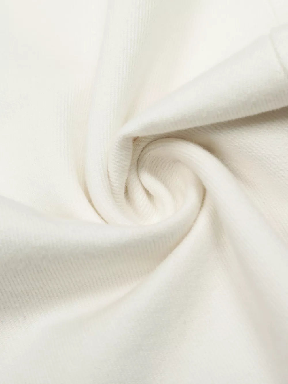White capri trousers with a textured fabric detail