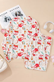 White collared pajama set with festive holiday print of mugs, jars, gifts, and candy.