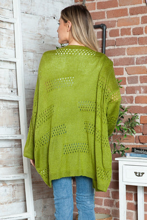Open-knit slouchy cardigan in matcha green with a relaxed fit and open weave details.