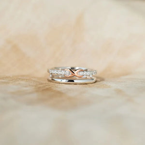 Infinity knot trio ring set in silver with rose gold accent and clear stones